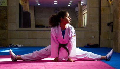 My name is Bushra 17 years old, a multiple gold medalist in Taekwondo and now also a social project owner and sports trainer for children in Amman.